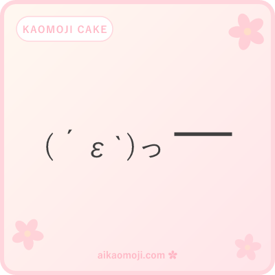 Kaomoji cake — happy face reaching for a block-element cake structure